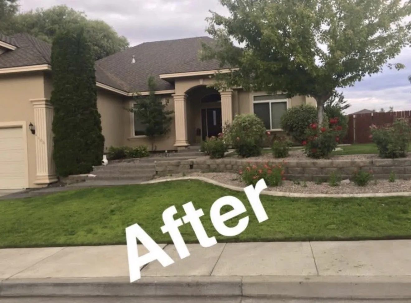 Front yard after landscaping shown in the project photo collection